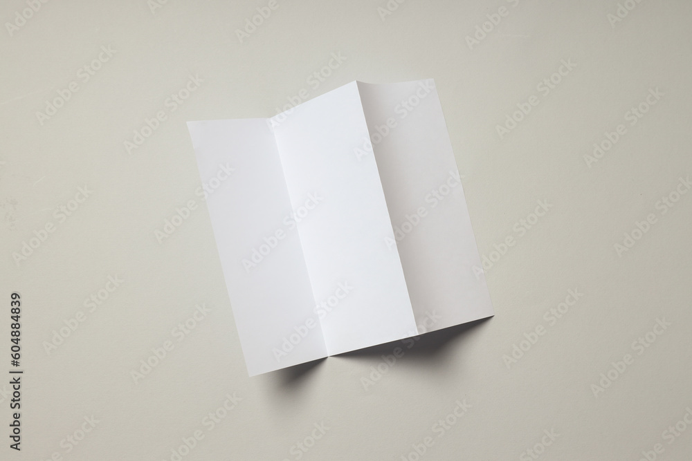 Blank white sheet on light gray background Blank white sheet on light gray background
