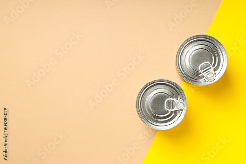 Canned food in blank metal jars, concept of canned food photo