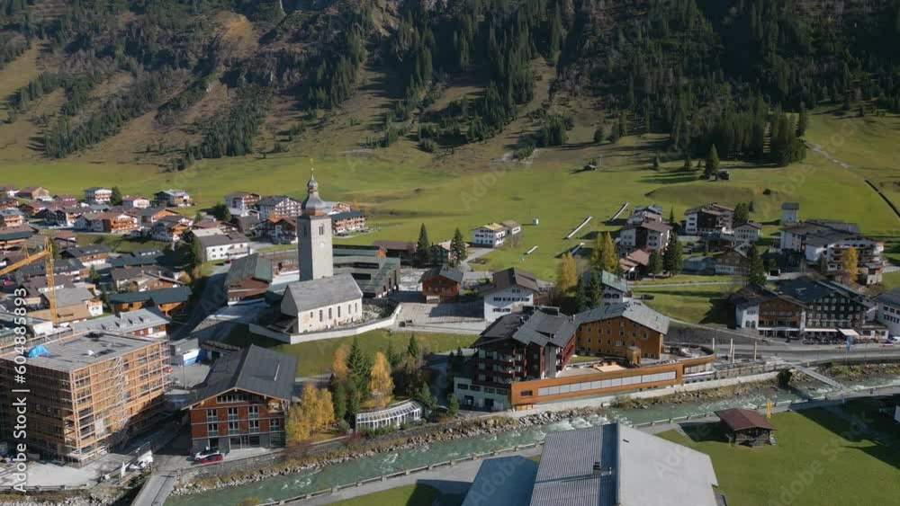 This aerial drone video shows the small village of Lech. Lech is a skiresort in Voralberg, western Austria. The town is located between the mountains of the Alps. This aerial drone video shows the small village of Lech. Lech is a skiresort in Voralberg, western Austria. The town is located between the mountains of the Alps.