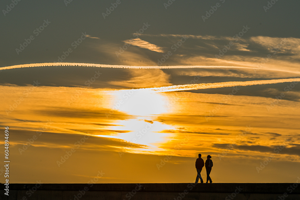Sun-kissed Serenity: A Romantic Stroll at Sunset