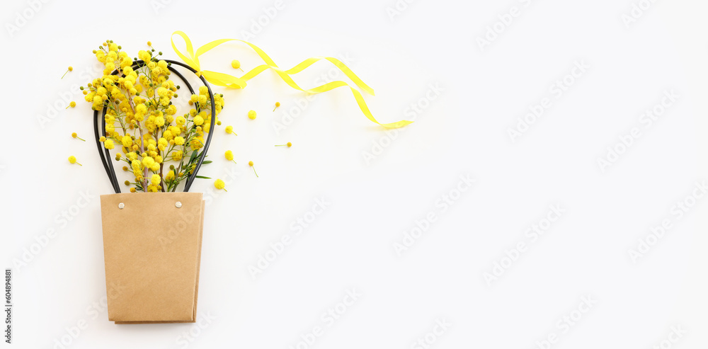 Top view image of spring yellow mimosa flowers composition over white isolated background - obrazy, fototapety, plakaty 