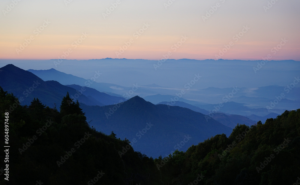 Mountain view nature landscape with light fog in winter season, Southern of Thailand