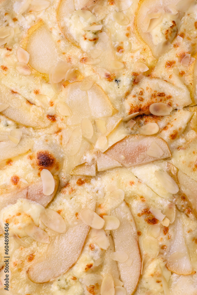 Delicious sweet pizza with pear, dorblu cheese and nuts Delicious sweet pizza with pear, dorblu cheese and nuts