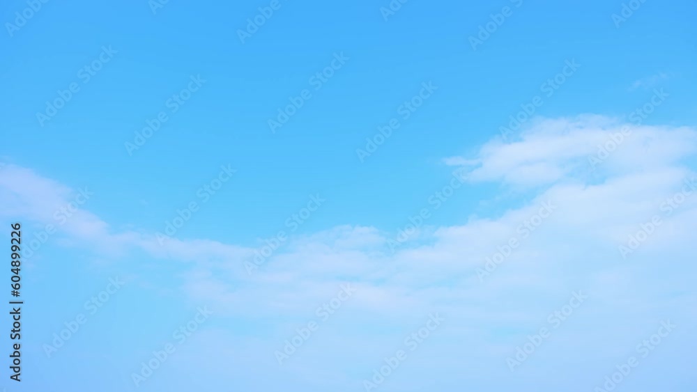 Fluffy clouds moving in the blue sky time-lapse is a stunning visual display capturing the grace and beauty of nature. resulting in a mesmerizing and dynamic sequence of shapes and patterns. 4K
Fluffy clouds moving in the blue sky time-lapse is a stunning visual display capturing the grace and beauty of nature. resulting in a mesmerizing and dynamic sequence of shapes and patterns. 4K