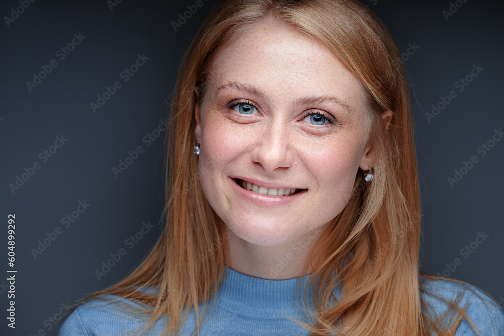 Natural beauty. Blonde woman with healthy skin. No makeup. Grey background. Natural beauty. Blonde woman with healthy skin. No makeup. Grey background.