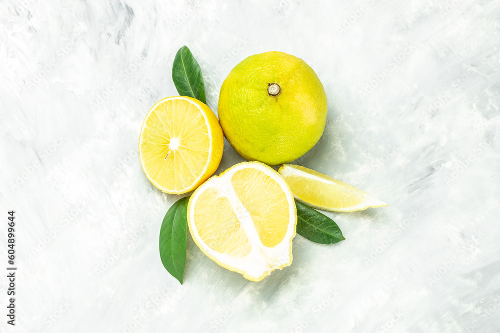 Bergamot citrus fruit on a light background. banner, menu, recipe place for text, top view Bergamot citrus fruit on a light background. banner, menu, recipe place for text, top view