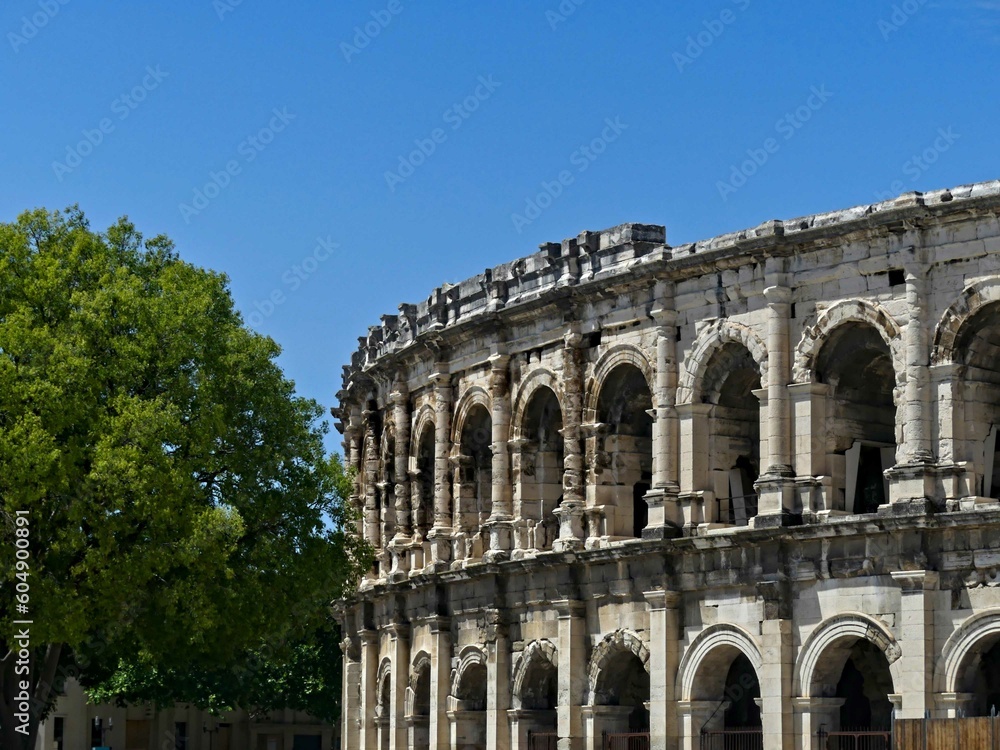 Nîmes, May 2023 : Visit the beautiful city of Nîmes en Provence - Historical city with its arena and ancient theater - View on the arena
