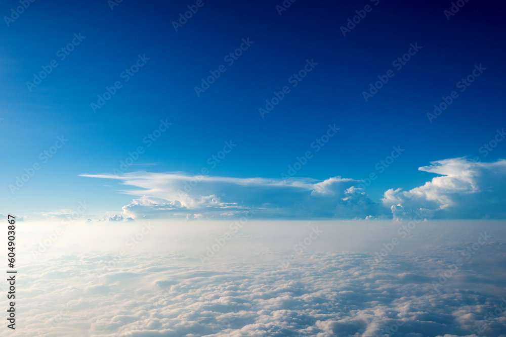Blue sky and white cloud from airplane window Blue sky and white cloud from airplane window
