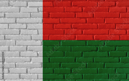 Madagascar country national flag painting on old brick textured wall with cracks and concrete concept 3d rendering image realistic background banner