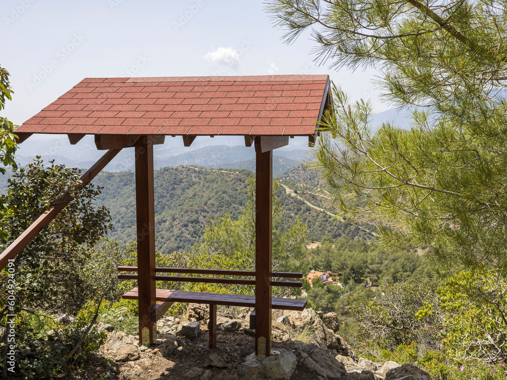 Covered bench with panoramic view on nature trail in Limassol National Forest Park, Cyprus Covered bench with panoramic view on nature trail in Limassol National Forest Park, Cyprus