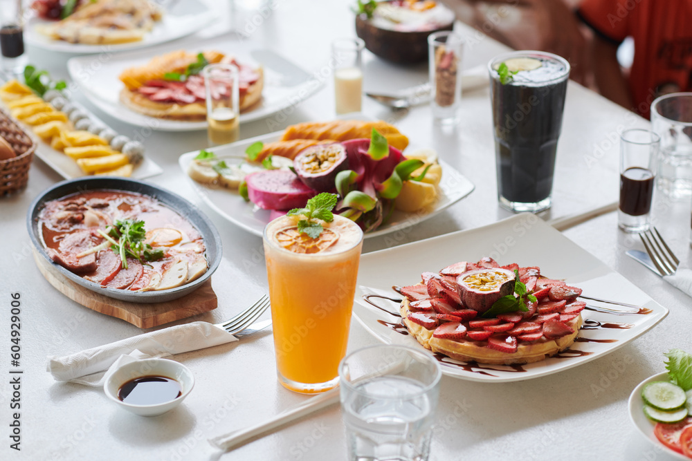 Brunch table setting with various delicious food