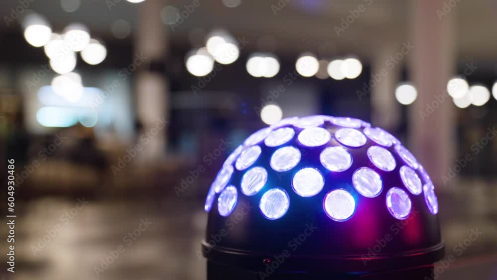 A dome-shaped color-changing light at an event - closeup A dome-shaped color-changing light at an event - closeup