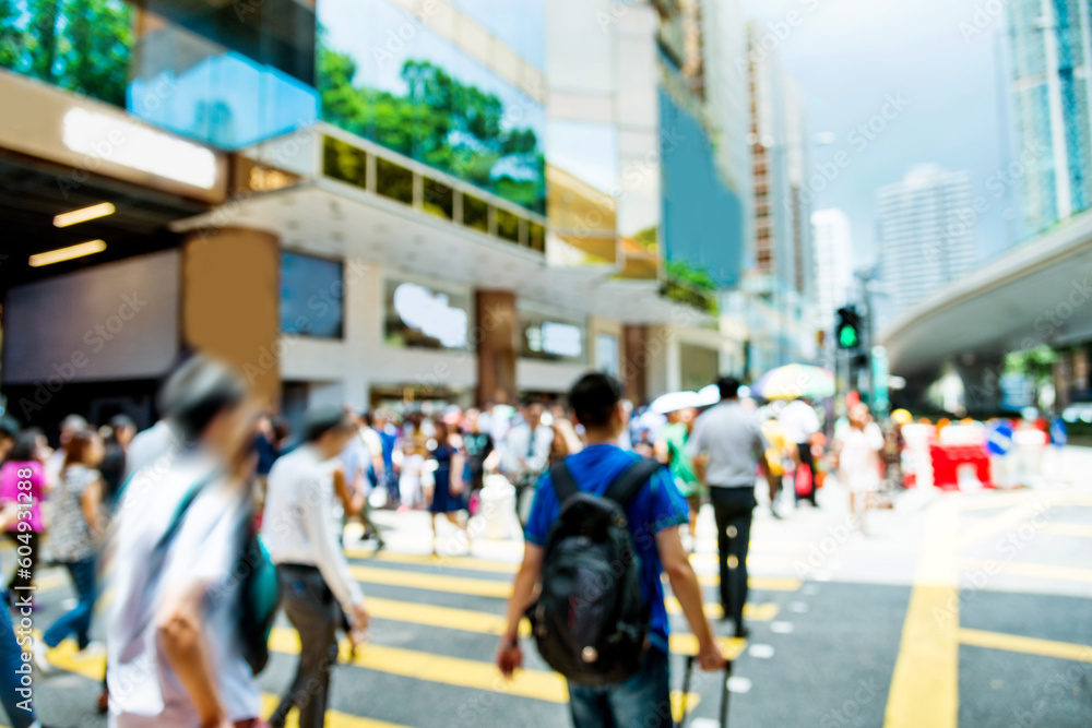 Blurred people walking down the street Blurred people walking down the street