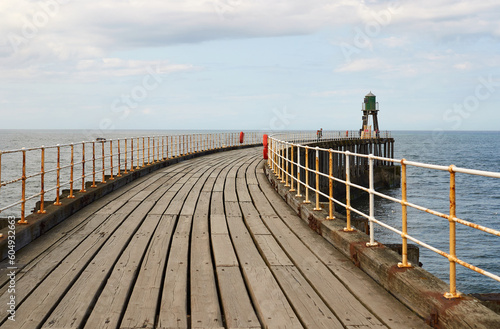 Wooden boardwalk planks on a pier