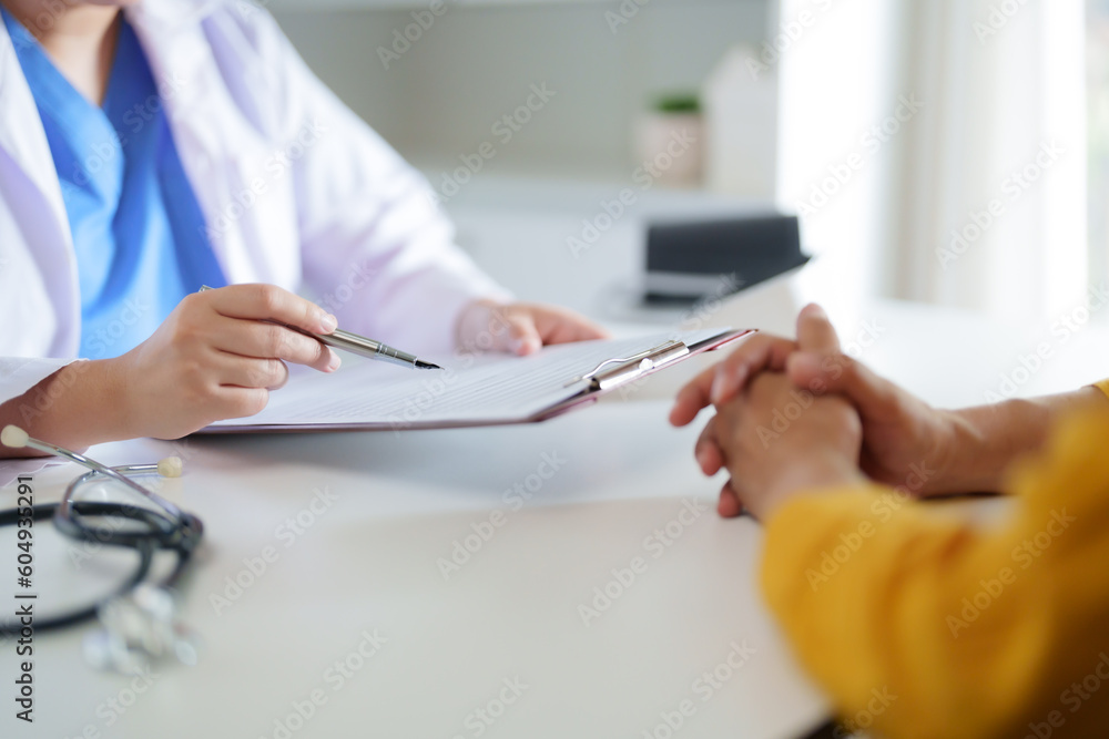 Doctor with patient consultation in medical office. Visiting Physician concept. Doctor with patient consultation in medical office. Visiting Physician concept.