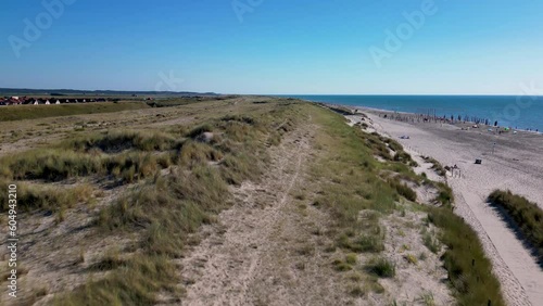 This aerial drone video shows the coastline near Petten. Enjoy the view of the beach and the dunes with the beautiful north sea in the background. 