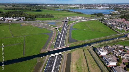 This aerial drone video shows an highway which is being build in the Netherlands. The highway connects the A4 with the A44 near Leiden. photo