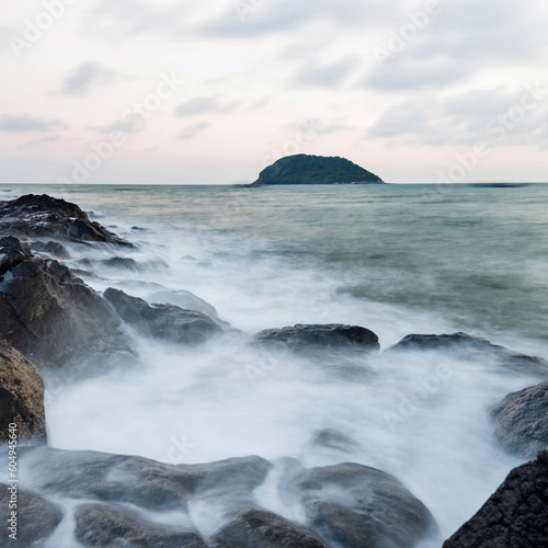 Sunset on the rocky shore.