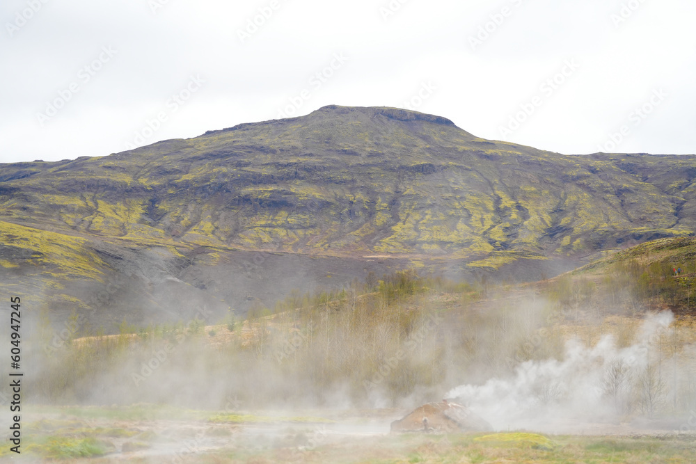 Majestic geysers erupting, sending plumes of steam and hot water into the air. Iceland's Gheyser Park is a geothermal wonderland Majestic geysers erupting, sending plumes of steam and hot water into the air. Iceland's Gheyser Park is a geothermal wonderland