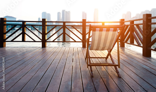 Deck chair on deck by the sea