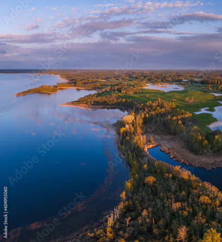 Sunset time bay lake Siver Nature of Latvia, Latgale. © mode
