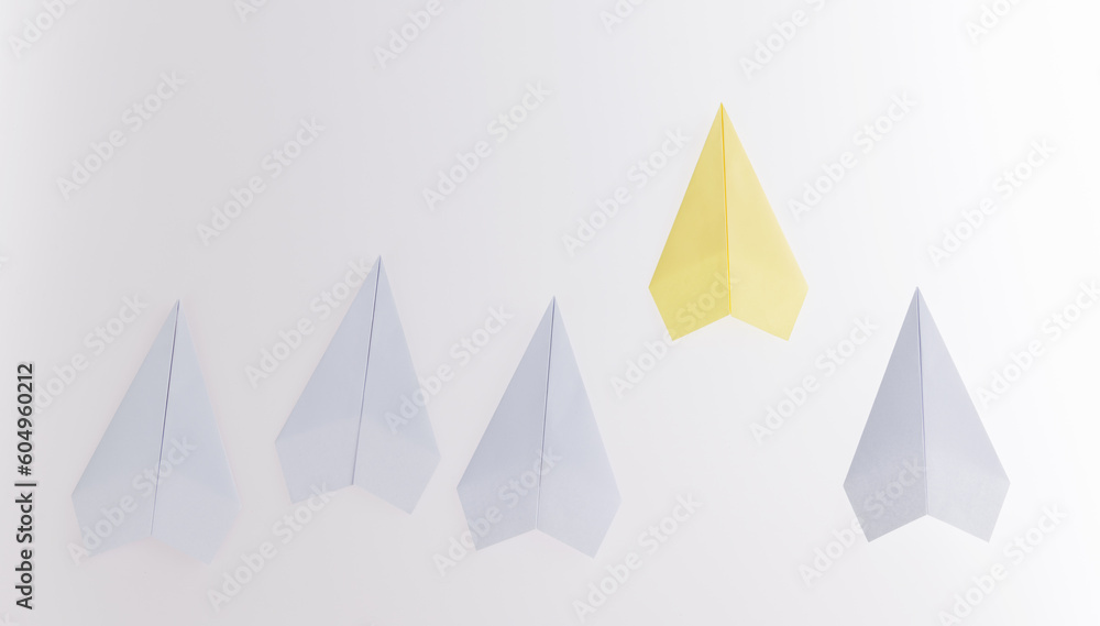 The yellow origami plane is leader The yellow origami plane is leader