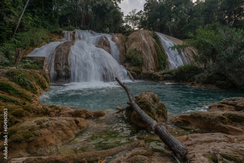 The Agua Azul waterfalls  a series of cascades of varying heights and widths  get their name from the colour of the water  which has a bright blue hue when accumulated Mexico.