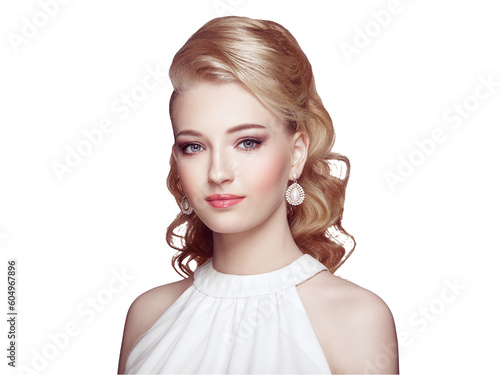 Fashion portrait of young beautiful woman with jewelry and elegant hairstyle. Blonde girl with long wavy hair. Perfect make-up. Beauty style woman with diamond accessories