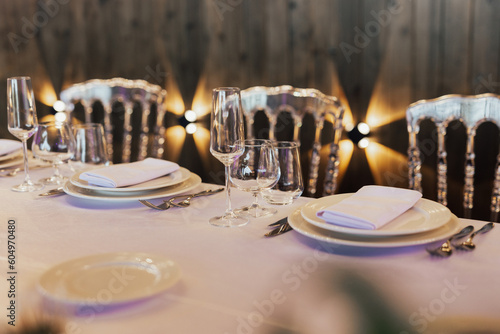 Obraz na płótnie Close-up of table setting for holiday. Wedding table with cutlery, decorated for guests in the luxury restaurant.
w salonie