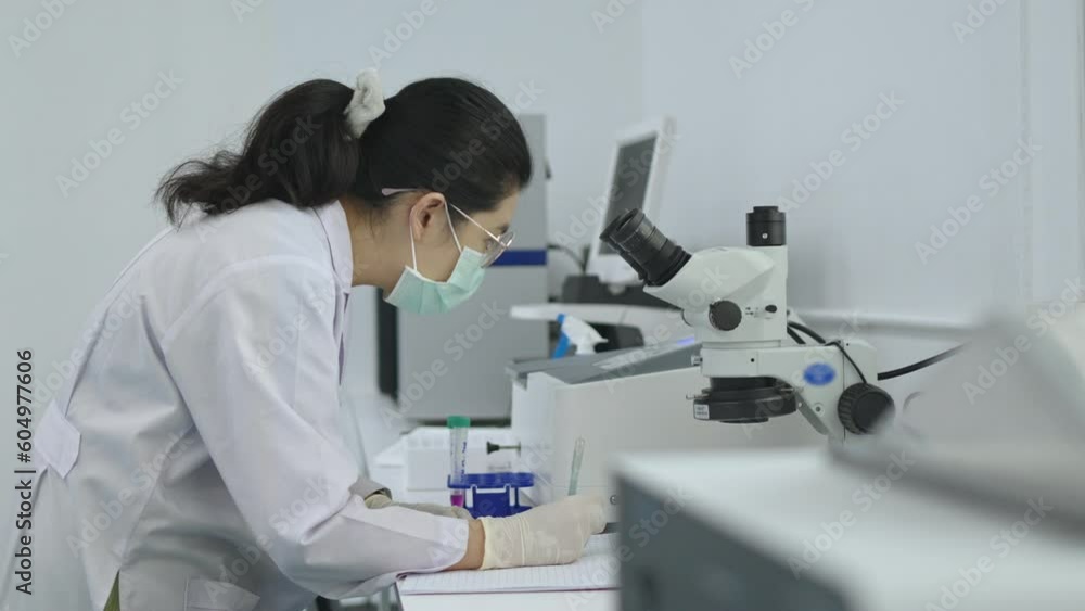 Chemical research scientists use uv visible spectroscopy to check the absorbance, Scientist working in the lab, Analyze data and collect chemical test results in modern laboratories. Chemical research scientists use uv visible spectroscopy to check the absorbance, Scientist working in the lab, Analyze data and collect chemical test results in modern laboratories.
