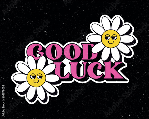 Modern good luck lettering with groovy smiley daisy flowers, shabby texture, design for t-shirt, sticker, poster. Black background. Positive motivational quote. Vintage style design. 