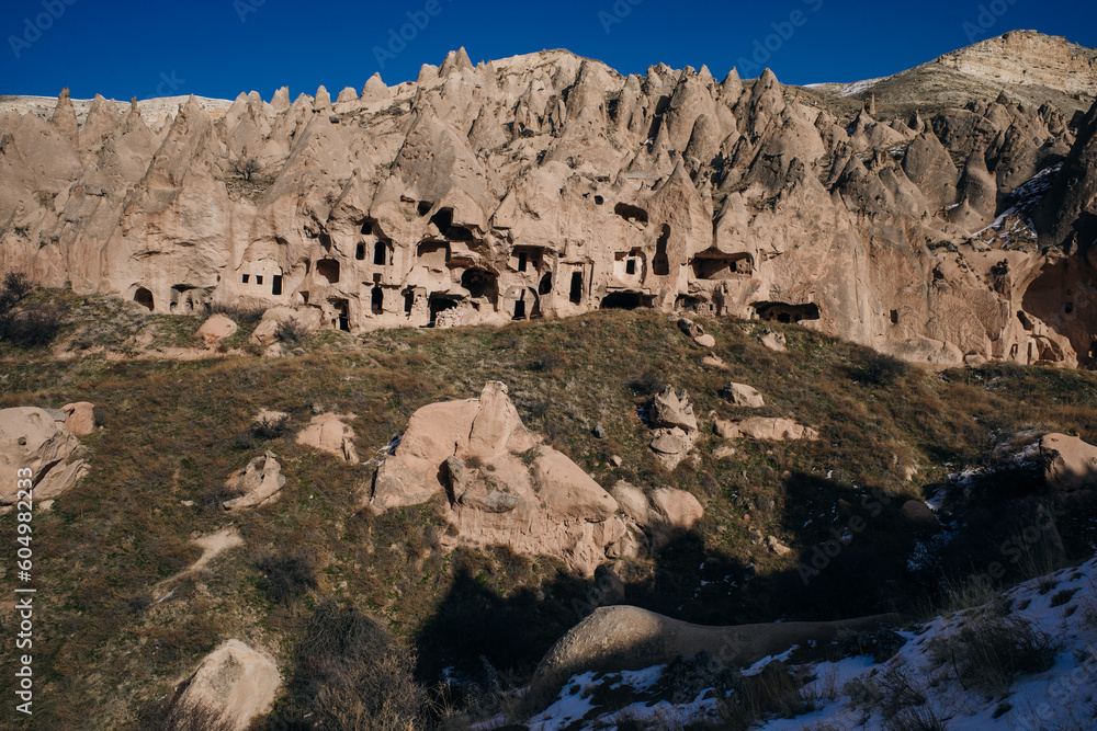 Cave town and rock formations in Zelve Valley, Cappadocia, Turkey - feb 2023