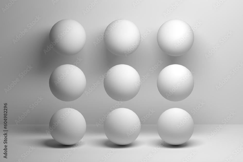 A composition of nine 9 white balls, spheres on white background. 3d render. A composition of nine 9 white balls, spheres on white background. 3d render.