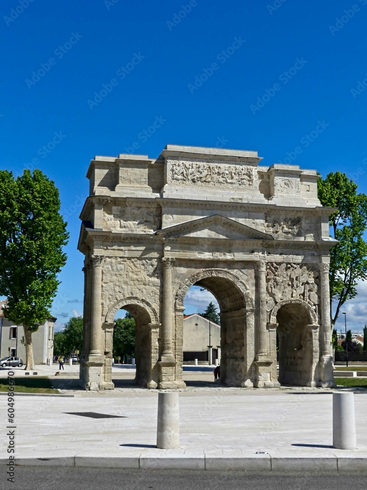 Fototapeta premium Orange, May 2023 : Visit the beautiful city of Orangeen Provence - Historical city with its arena and ancient theater - View on the triumphal arch