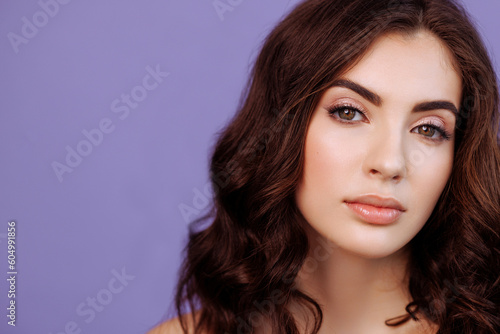 Beautiful woman face close up healthy skin care. Beauty fashion portrait