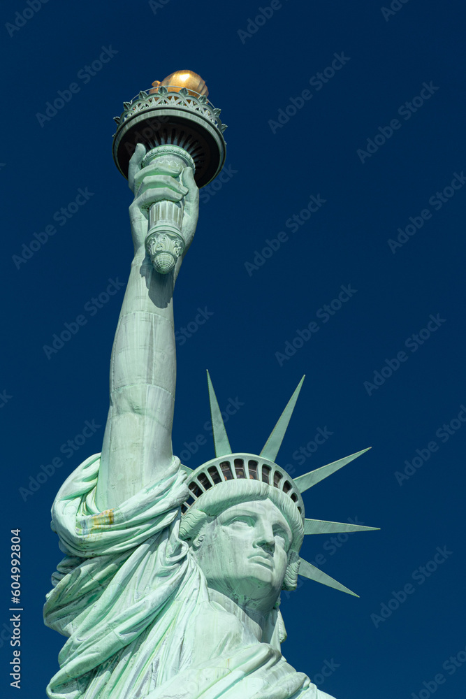 Fototapeta premium Close-up of the crown, the arm, and the torch of the Statue of Liberty, New York