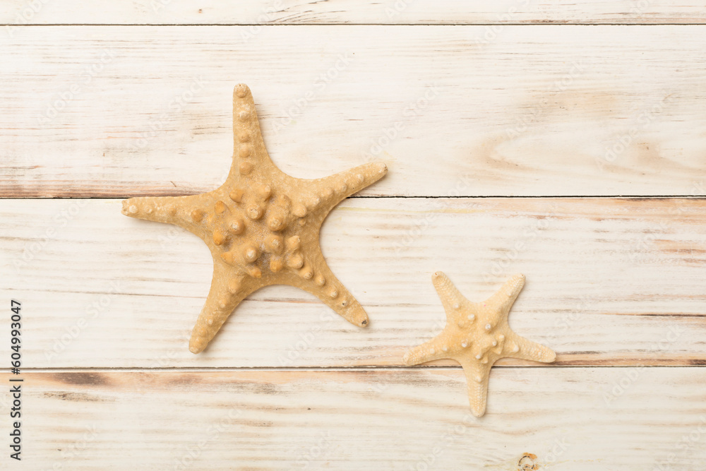 Starfishes on wooden background, top view Starfishes on wooden background, top view