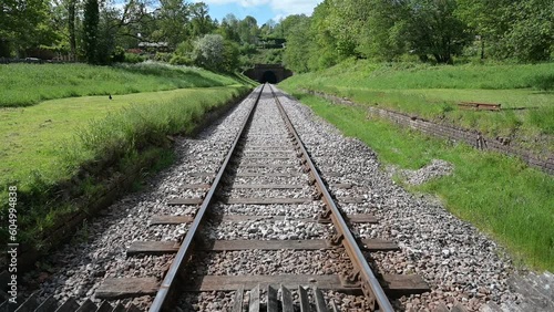 A single track with the sun moving its shadow across the track. 