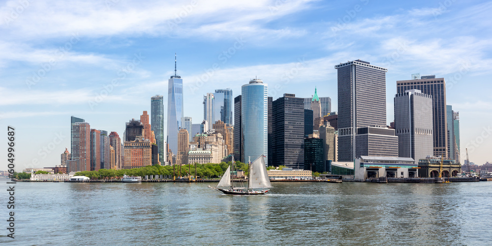 New York City skyline of Manhattan with World Trade Center skyscraper and sailing ship panorama in the United States
