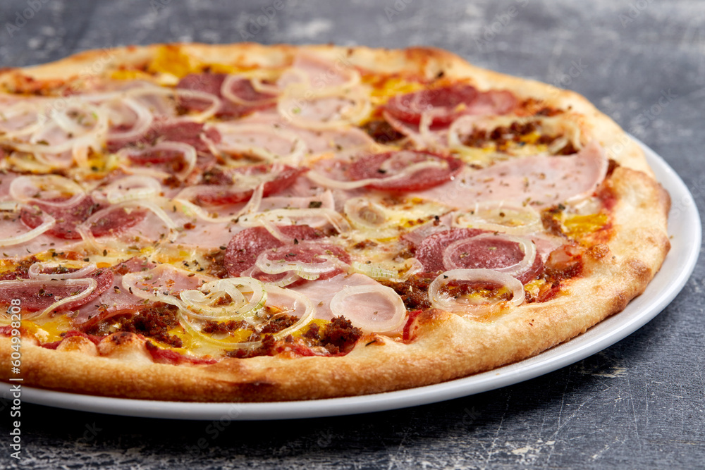 tasty pizza on the wooden background tasty pizza on the wooden background