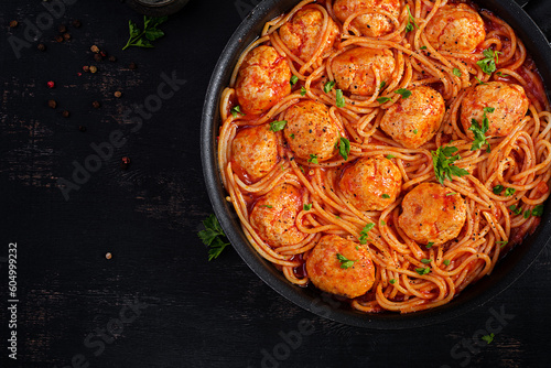 Spaghetti pasta with meatballs in tomato sauce. Italian pasta. Top view, flat lay