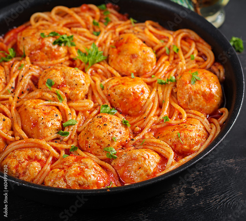 Spaghetti pasta with meatballs in tomato sauce. Italian pasta.