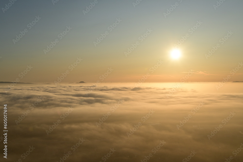 sunset on the clouds