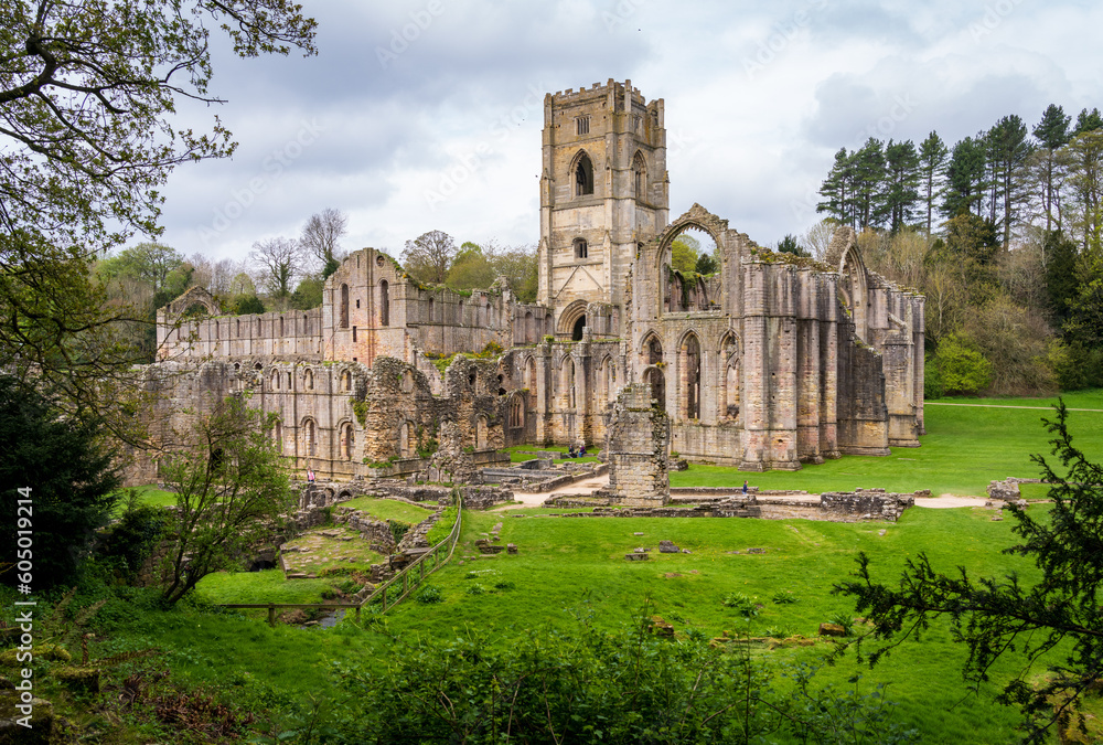 Detail of the ruins of Fountains Abbey in Yorkshire, United Kingdom in the spring as leaves start to appear