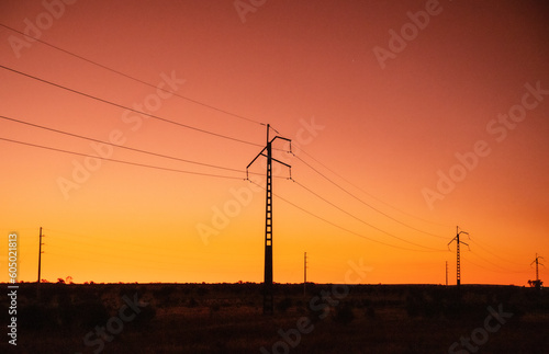 Power lines at dawn outside of Alice Springs, Northern Territory, Australia photo