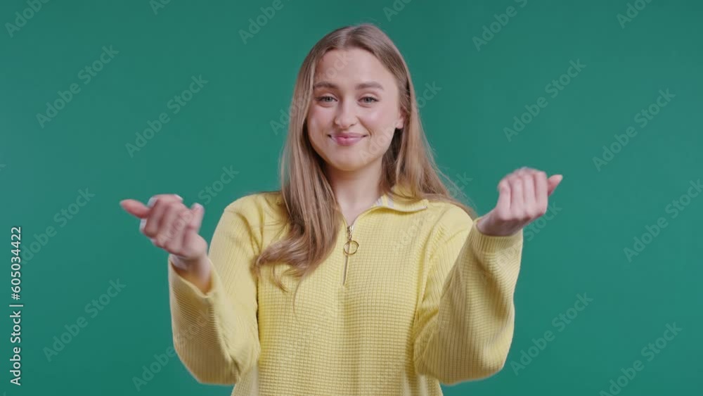 Woman asks join her, beckons with inviting hand hugs gesture. Hey you, come on Woman asks join her, beckons with inviting hand hugs gesture. Hey you, come on