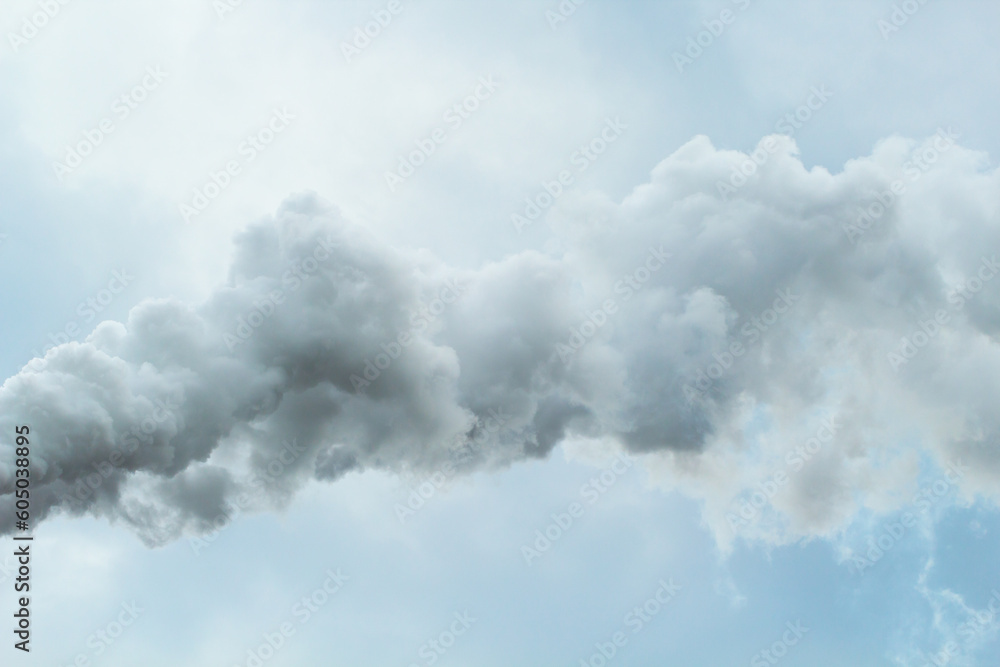 Thick smoke from chimney of chemical plant over cloudy sky background Thick smoke from chimney of chemical plant over cloudy sky background