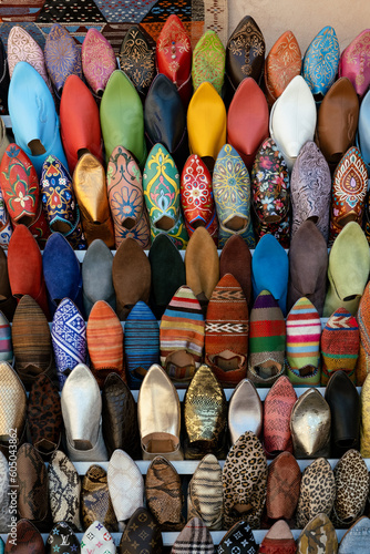 Traditional arabic style loafers of colors in the streets of the Marrakech Medina in Morocco © Adrinson