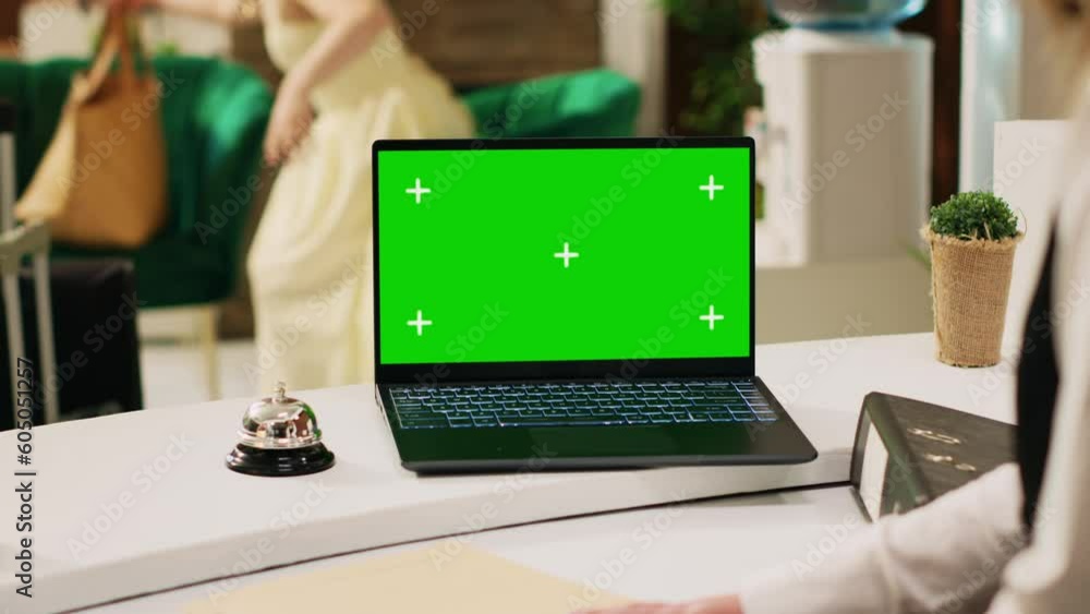 vid-o-stock-employee-checking-greenscreen-template-on-laptop-working