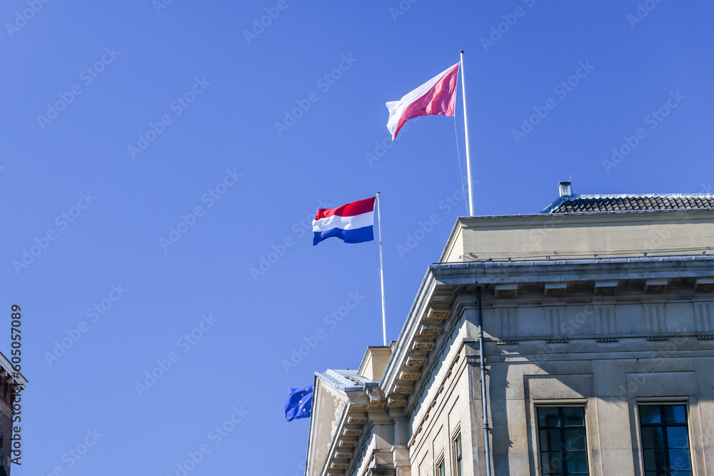 Utrecht, Netherlands - April 2, 2023: Regional and national flags of the Netherlands and the EU in old town Utrecht
